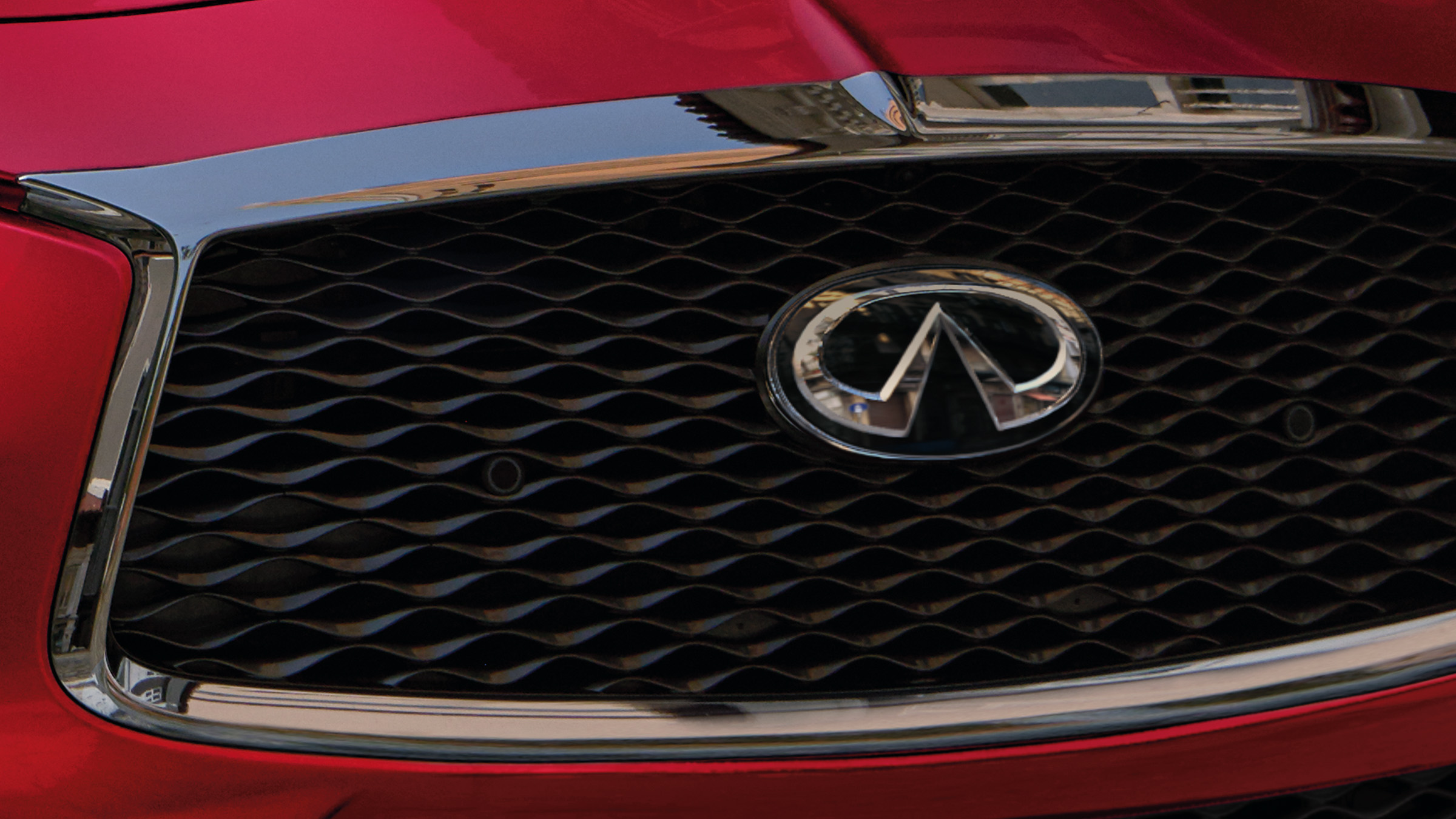 2022 INFINITI Q60 red car double arch grille.